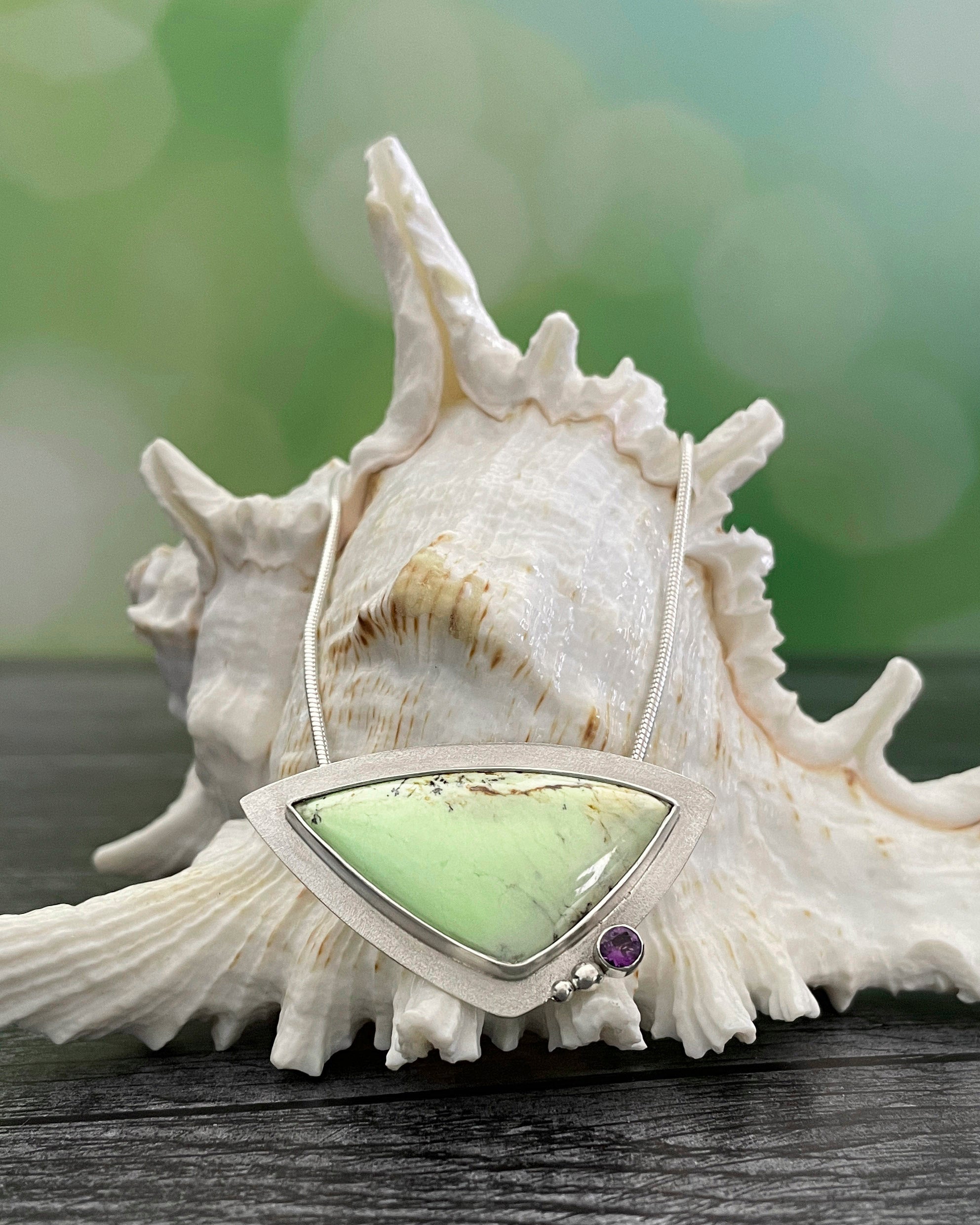 lemon chrysoprase and amethyst pendant on shell