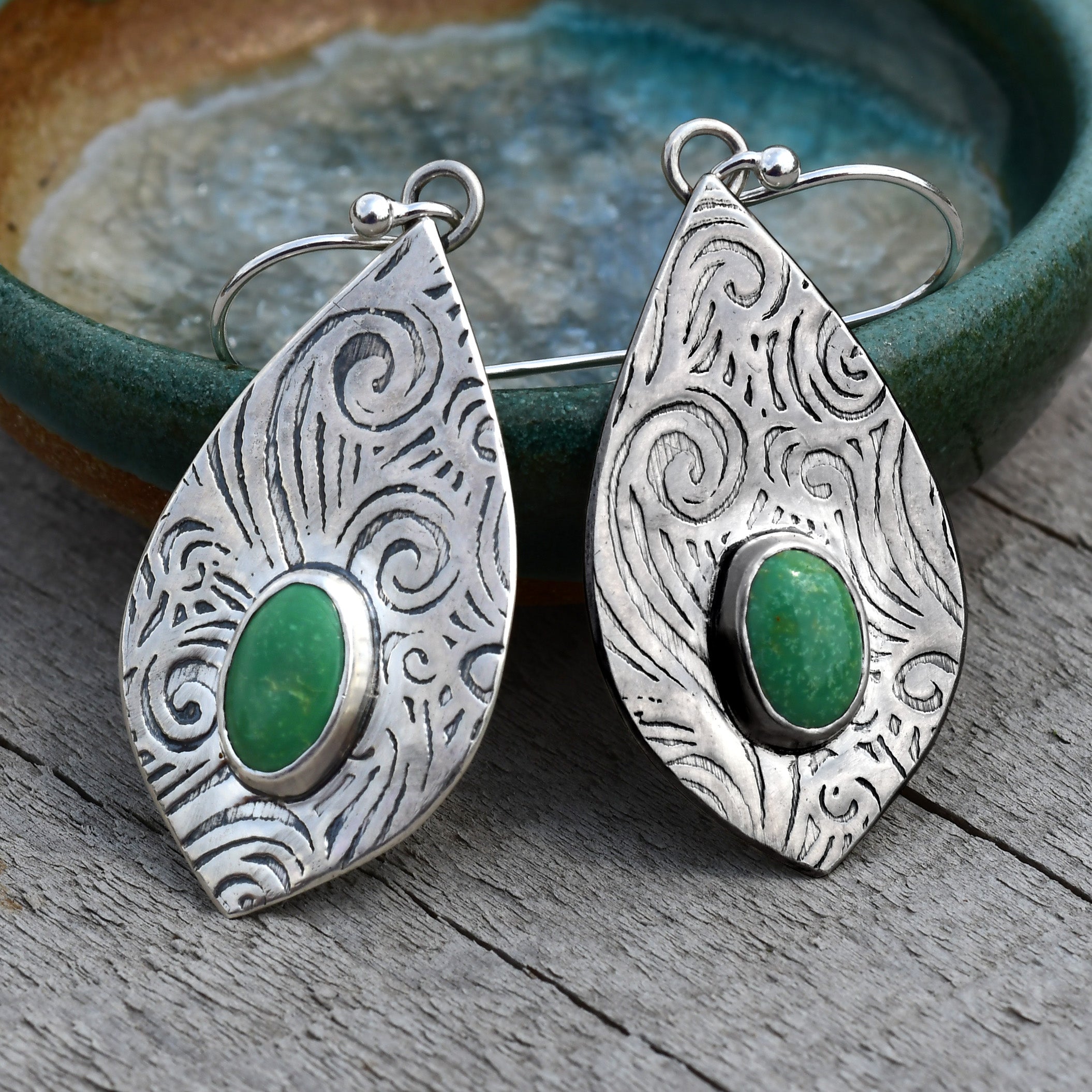 teardrop turquoise earrings on prop